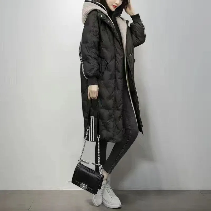 Itzel | Longue veste d’hiver matelassée à capuche